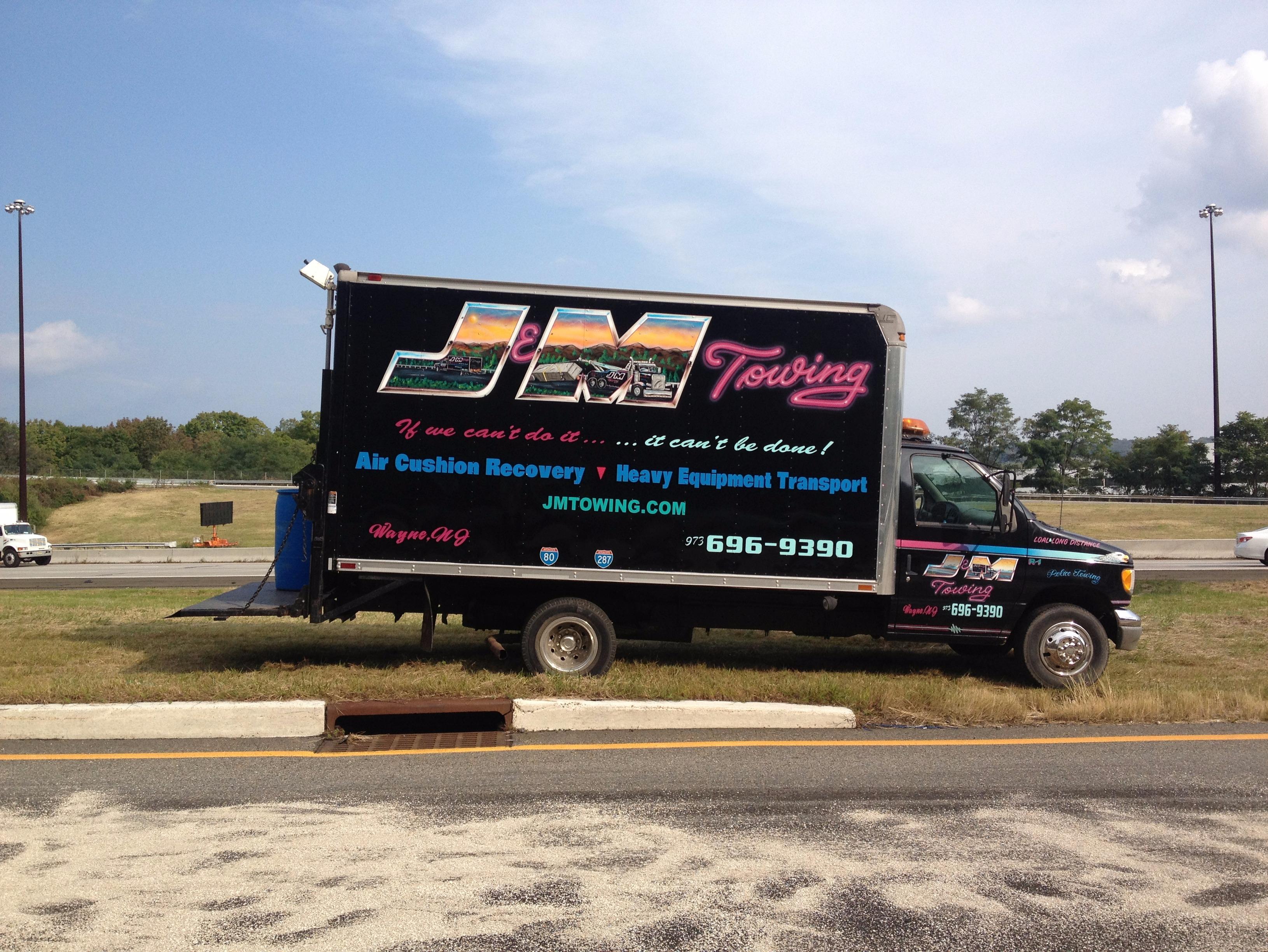 J & M Towing is a family owned business and we take pride in what we do. We are committed to providing the best service and competitive pricing on our towing & recovery services. We realize that if you’ve been involved in an accident or your vehicle has broken down, it’s already been a pretty bad day. That’s why when you contact J & M Towing, our guys will do everything possible to make your experience with us a great one.

J & M Towing was started by Joe Laborda back in 1976 with only one truck. Through hard work and a commitment to always put the customers’ needs first, word got around and the business began to grow. In order to provide an expanded array of services and accommodate the many needs of our customers, we opened a new facility in 2008. This secure facility is equipped with security cameras, lights, and fencing all around so we are able to provide safe, secure indoor and outdoor storage of our customers’ vehicles. We also work with several area police departments who use our facility to store stolen cars and other vehicles because they know that valuable evidence won’t be tampered with!
24
Over the years we have received awards from Tow Times Magazine, American Towman Exposition, The Maine Tow Show, and Statewide Towing Association Trade Show. J & M Towing has also won Best of Show in New Hampshire and are proud to be featured in “The Greatest Towing Companies in the World!”

Towing
J & M Towing is an experienced, full service towing & recovery company offering a wide range of services. Our fleet consists of wreckers, flatbeds, landolls, and a 40-ton Peterbilt rotator crane so there is literally no project that we can’t handle. See us for the absolute best in:
Light Duty Towing | Medium Duty Towing | Heavy Duty Towing | Long Distance Towing | Flatbed Towing | Heavy Equipment Hauling | Motorcycle Towing | Motor Home Towing | Winching | Impounding |  Multi-Vehicle Transport | Hazmat Cleanup | Repossessions | 
Load Transfer Service | Load Shift Service | Underwater Recovery | Jump Starts | Lock Out Service | Fuel Delivery | Tire Changes | Custom Hydraulic Hoses | Lowboy Service | Landoll Service | Roll Off Container Service | Air Cushion Recovery | Rotator Crane Service | Forklift Service | Used Car Sales | Indoor & Outdoor Storage

Heavy Transport
Heavy equipment hauling is something many towing companies provide, but few can do it as well as J & M Towing. You see, heavy equipment hauling is not something we do as a sideline, it’s a specialty of ours and we have the right equipment and the right people to get the job done.
Our fleet includes flat beds, lowboys, and specialty equipment so we are able to handle full loads, L-T-L, oversized loads, and more. Construction equipment, trailers, forklifts, vehicles, generators, steel beams…bring’em on! Whatever you have to get from point A to point B, J & M Towing will make sure it arrives safely and on time!
All freight is covered to full value by our insurance and we will be happy to handle all of the routing and transportation permits as well.

Heavy Recovery

While J & M Towing is available 24/7 for all kinds of light, medium, and heavy duty towing, it is our heavy-duty recovery services which really separate us from the competition. At the heart of a fleet is a 40-ton Peterbilt rotator crane with 5 winches and the ability to lift a truck and spin it 360 degrees. It is fully equipped with special recovery equipment so whether your dump truck has run off the road or you need to lift a generator or A/C unit onto a roof, we can get it done. We have 3 forklifts for use when necessary and while we have a moment, we want to tell you about our people. They’re simply the best in the business. All of our heavy-duty operators are either Wreckmaster or TRAA certified. They are prompt, courteous, experienced, and thoroughly professional. Many of them have been with us for a long time so they not only know their job, they know what is expected of them.

When J & M Towing is on the job, you can take confidence in the fact that one of the best in the business is behind you all the way. Thank you for your business and for placing your trust in us, we won’t let you down.
Remember: "If we can't do it, it cant be done!"
Call or Click jmtowing.com Today! 973-696-9390