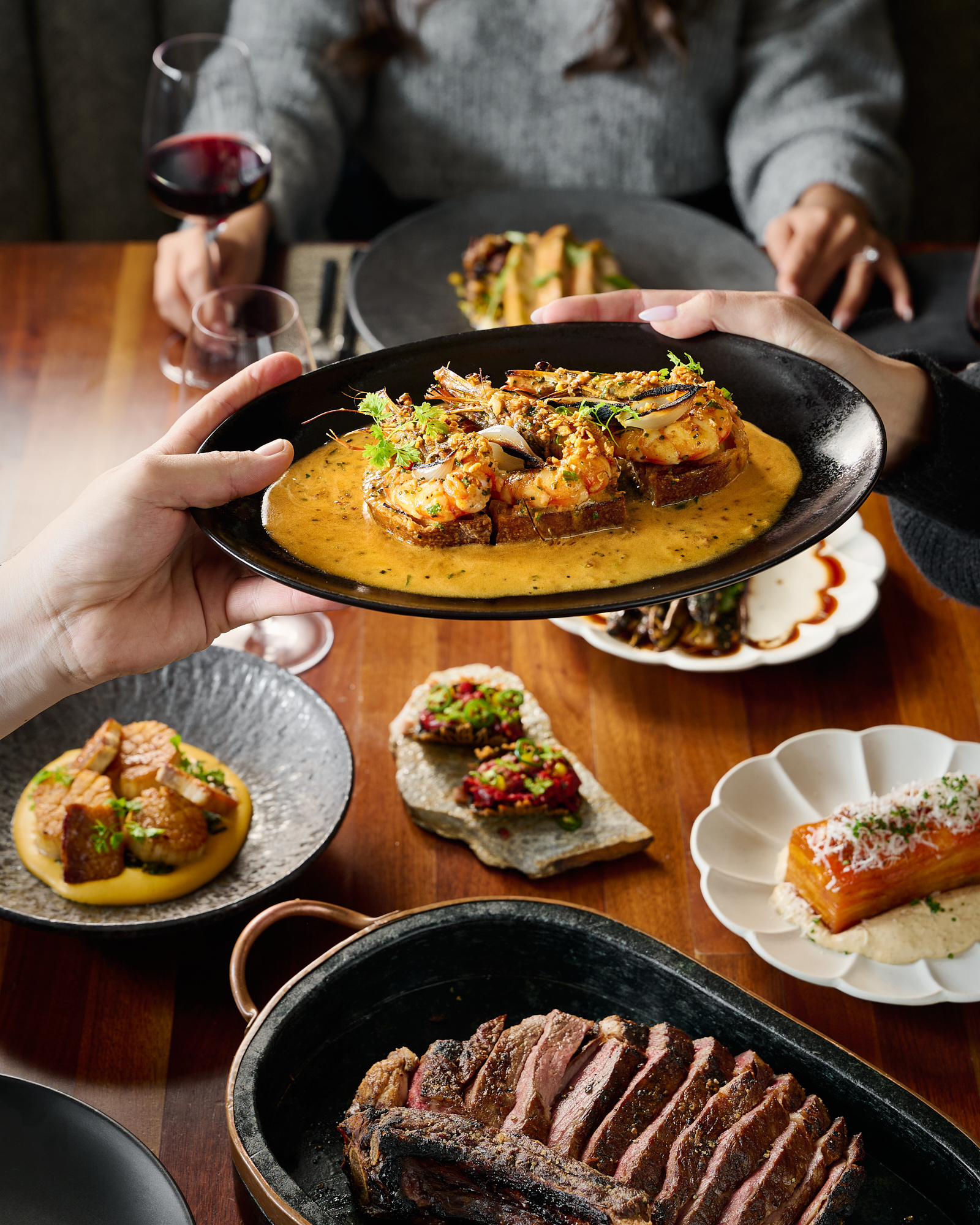The kind of spread that turns a weeknight into something worth celebrating. Glazed prawns, wagyu steak, our signature Magic Mushroom and more &mdash; all made to share, but hard to give up.