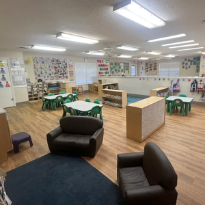 Bright and colorful preschool classroom at Childcare Network with age-appropriate learning materials
