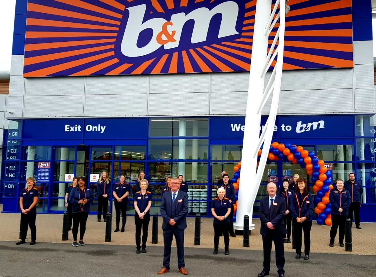 The store team at B&M's newest store in Lisburn pose in front of their wonderful new B&M Store, located at Sprucefield Retail Park.