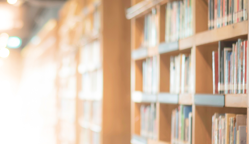 Books on shelves in the library.