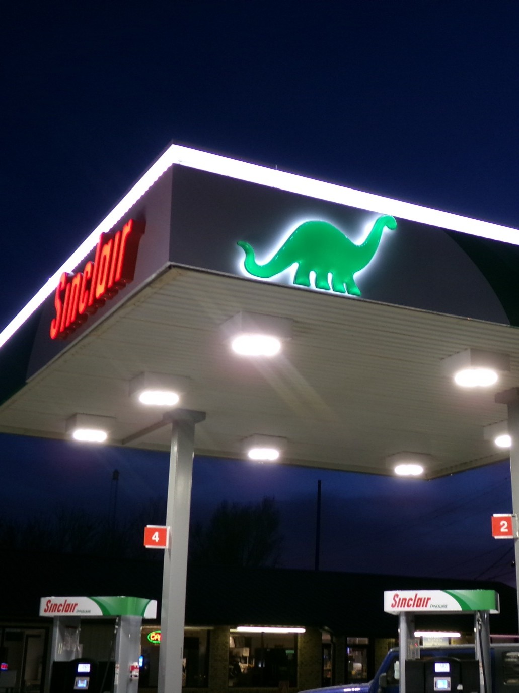 Sinclair gas station fueling island
