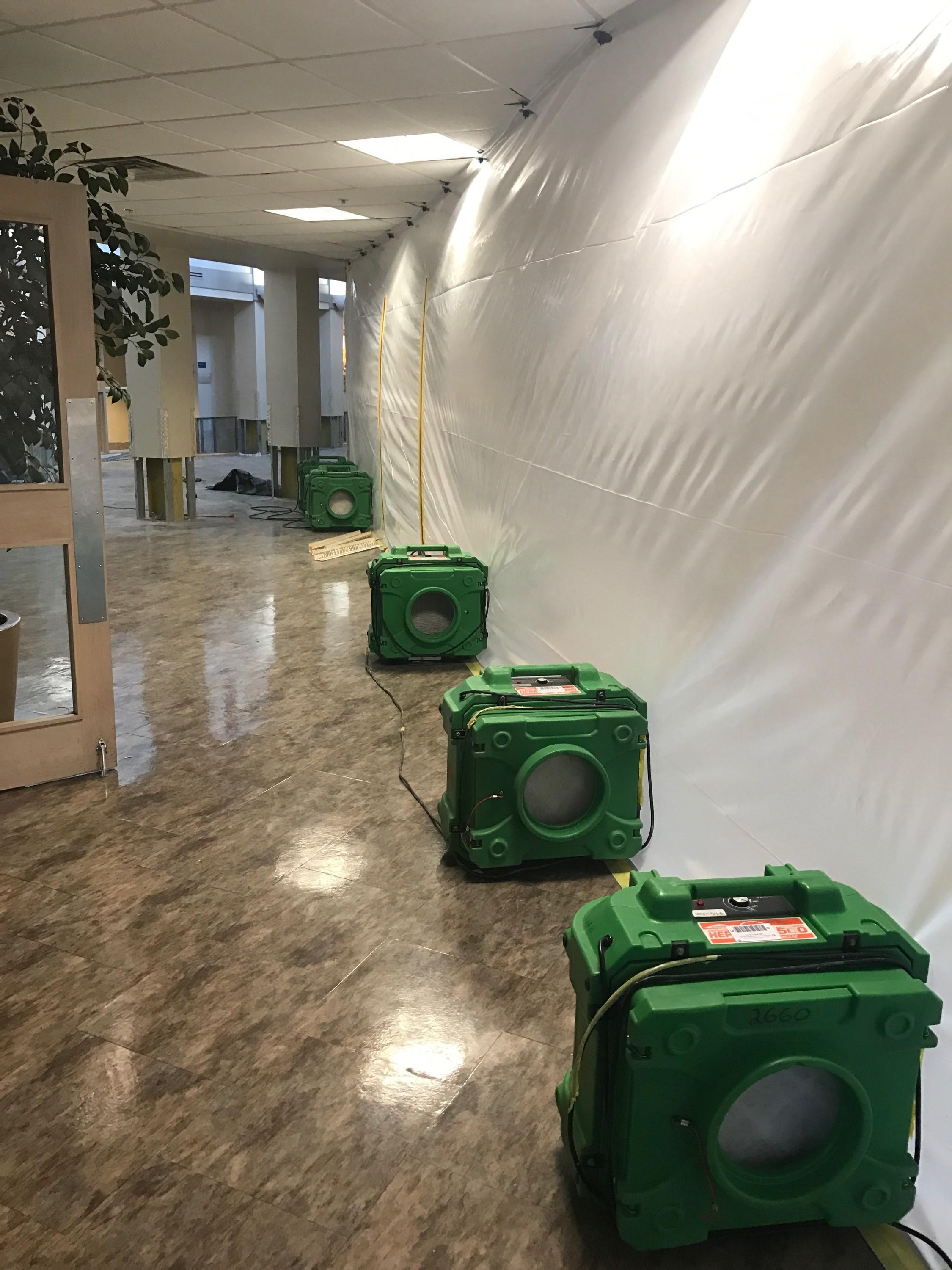 After weeks of catastrophic rain/flooding at the Great Lakes Naval Base in Illinois, SERVPRO of The Seacoast set-up several barriers and fans to dry the areas affected.