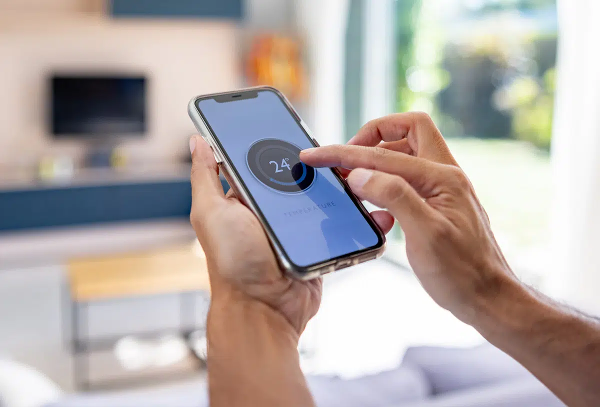 Smart thermostat control system allowing homeowners to easily adjust indoor temperature for optimal comfort and energy efficiency. Modern thermostat installation helps improve HVAC performance, reduce energy costs, and maintain consistent heating and cooling throughout the home.