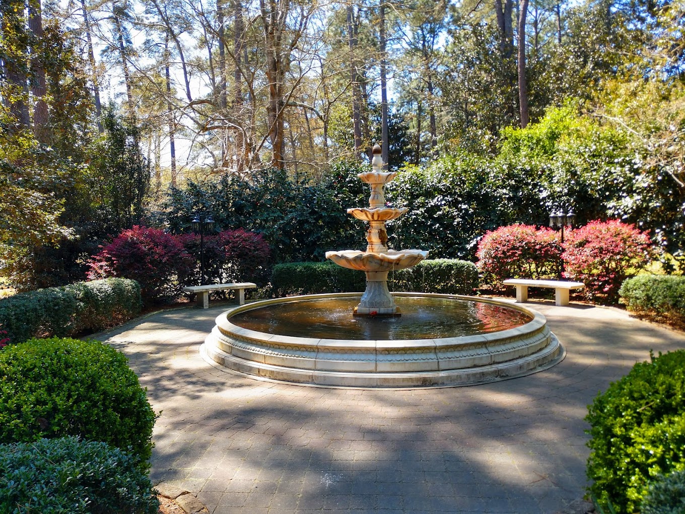 The surrounding 26-acre estate is open to the public for use as a natural preserve and park, with formal gardens designed by Alfred Yeomans, and is the gateway to the longleaf pine forest in the Boyd Tract of Weymouth Woods.