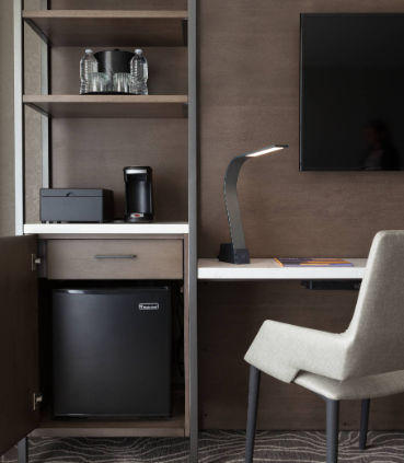 Reserve a Concierge level hotel room for enhanced amenities, including a mini-refrigerator.