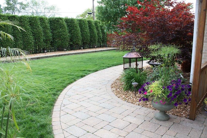 PAVOR walkways brighten up your yard. Cosme Landscape Maintenance Alsip (708)636-6720