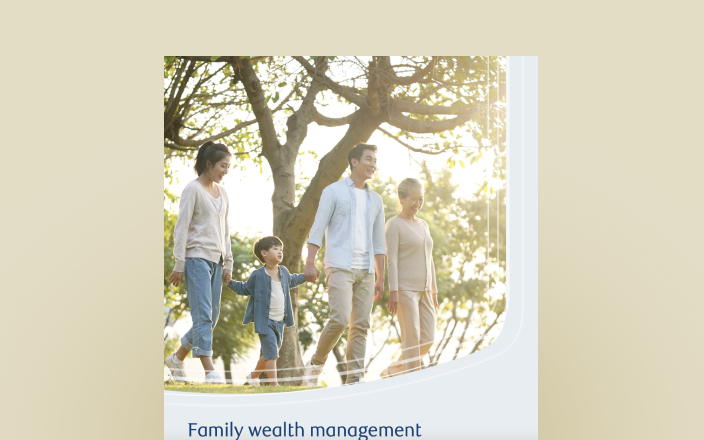 Cover photo of the Family wealth management guide with a multigenerational family walking hand in hand.
