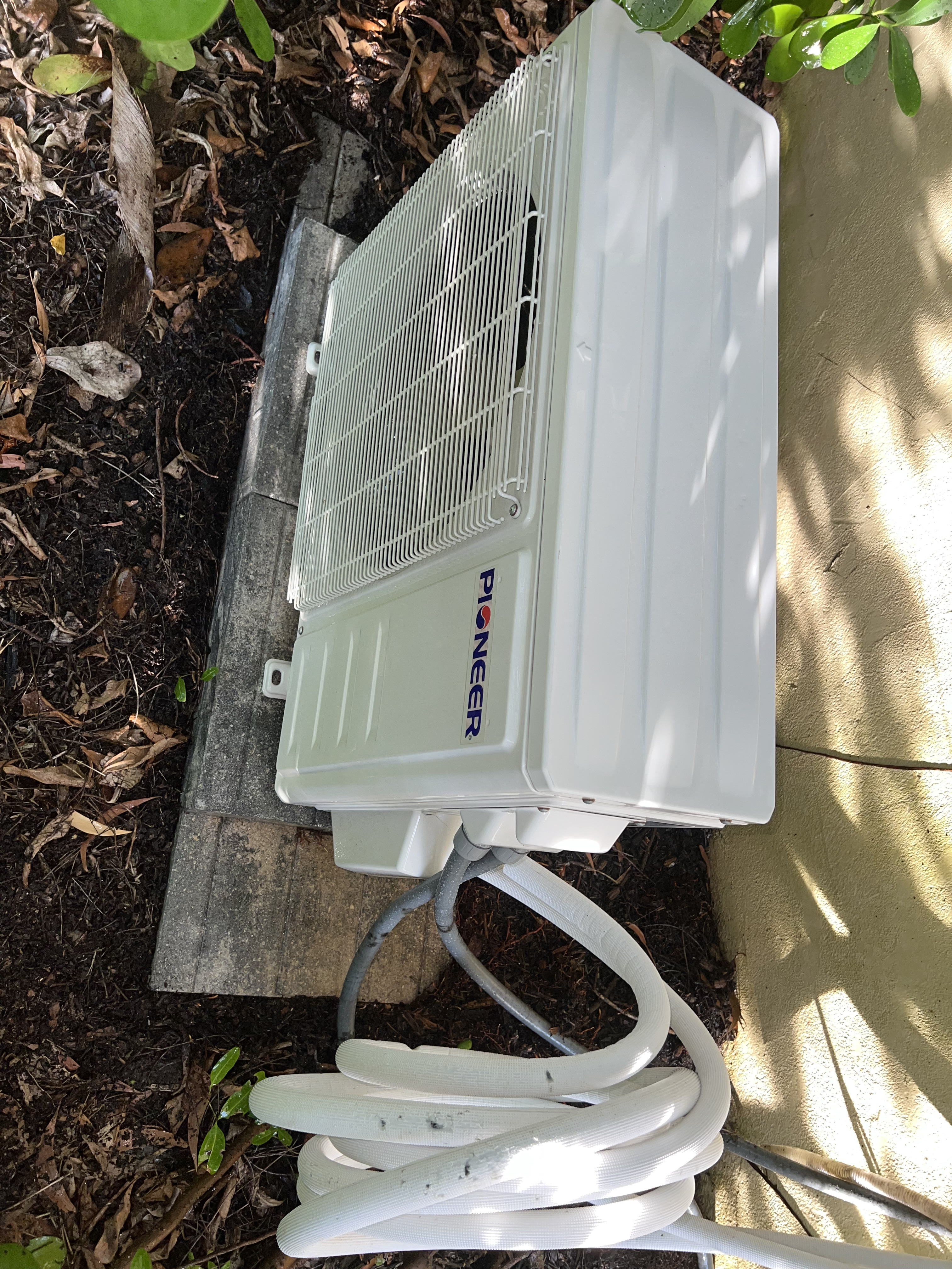 Pioneer ductless mini-split outdoor condenser installation by Tri-County HVAC in Palm Beach County. 