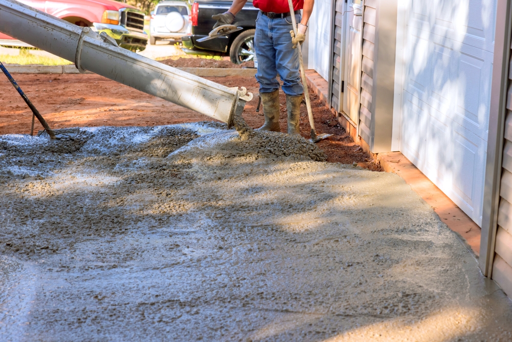 We love building a concrete driveway! It's a project where we can see positive results in a short period of time. Most homeowners can't believe how much better their home looks after a new drive is installed. If you're looking for immediate curb appeal, this is the way to go! Are you considering a new driveway? Call our Loveland, Ohio office today for a FREE estimate.