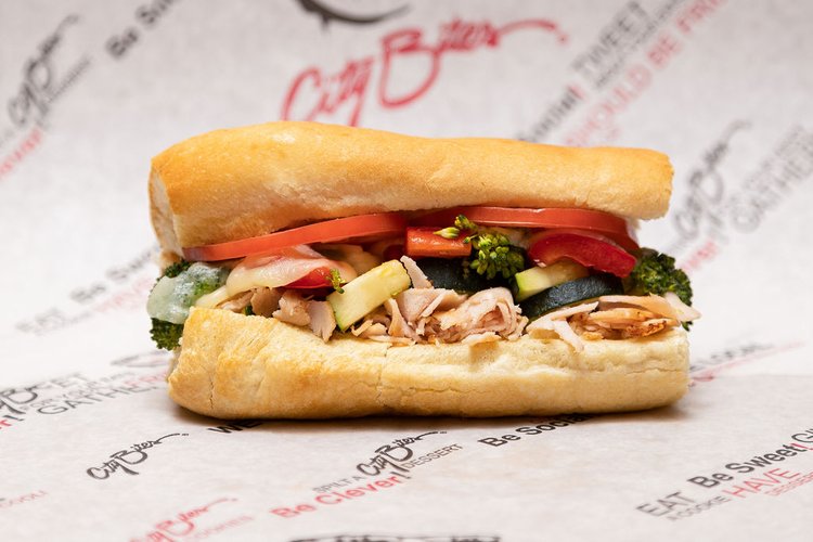 Grilled turkey breast, melted provolone, grilled veggie mix, tomatoes, City Bites' ranch dressing, salt & pepper.