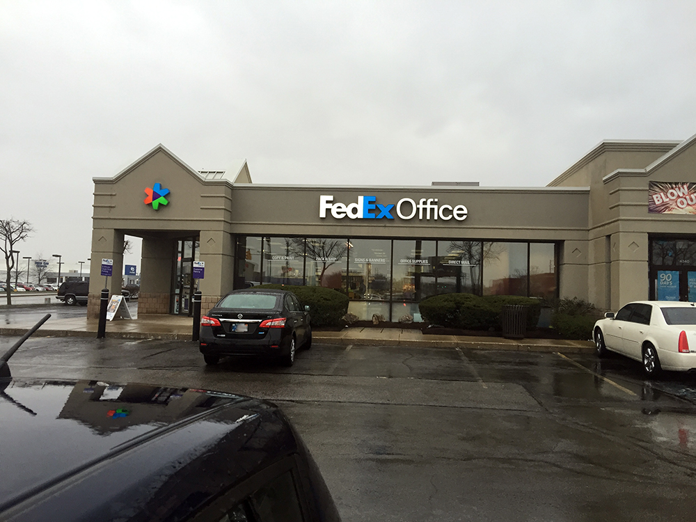Exterior photo of FedEx Office location at 5030 W Pike Plaza Rd\t Print quickly and easily in the se FedEx Office Print & Ship Center Indianapolis (317)297-2679