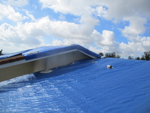 Roof tarping