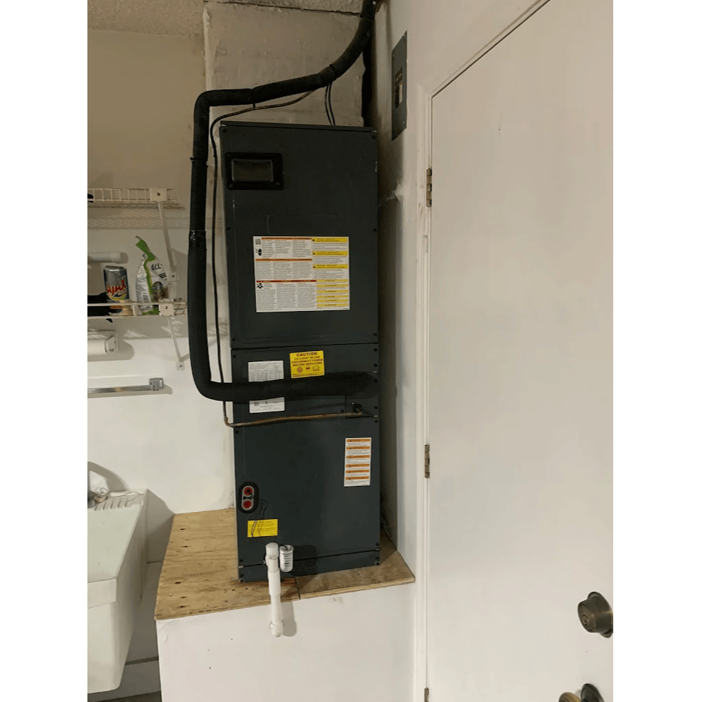 Indoor HVAC air handler unit installed in residential home for heating and air conditioning system by Gotcha Heating and Air Inc in Spring Hill Florida