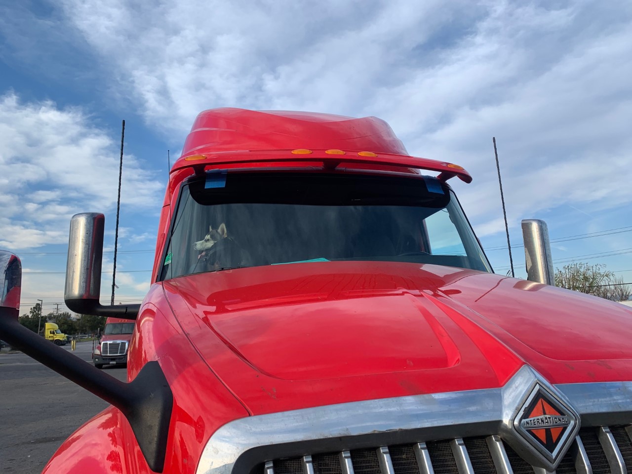 JVC Auto Glass-- red truck winshield