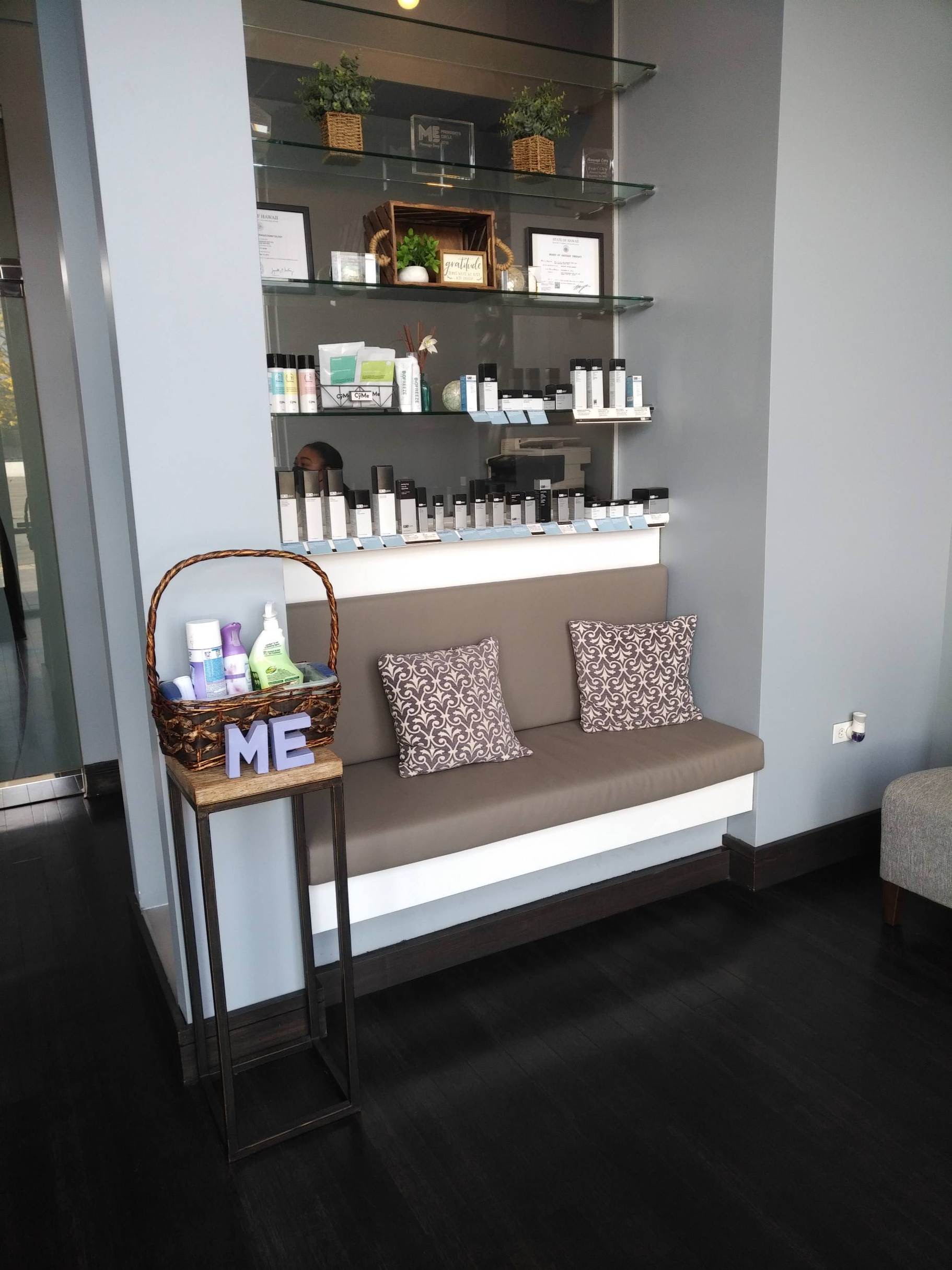 Display with various products available for purchase at Massage Envy Pearl Highlands Center.