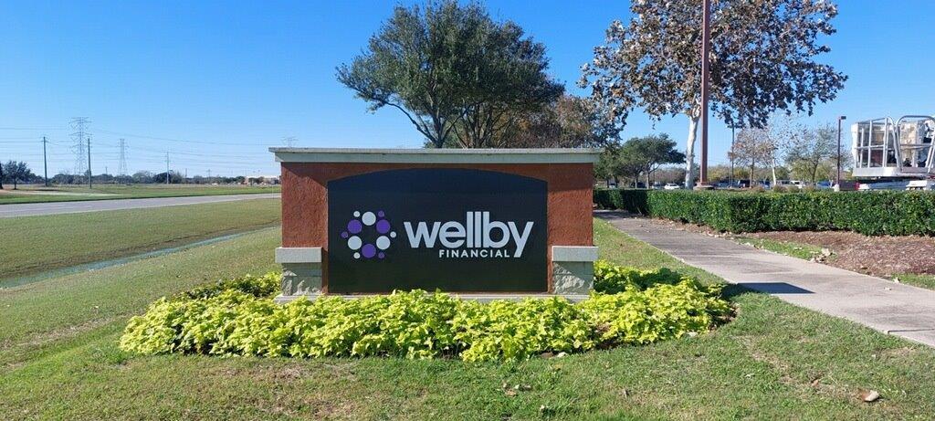 Exterior signage of Wellby Financial in League City