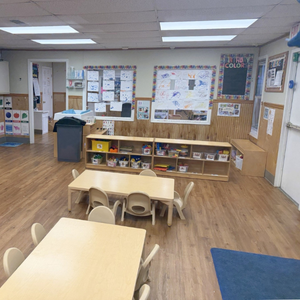 Bright and colorful preschool classroom at Childcare Network with age-appropriate learning materials 