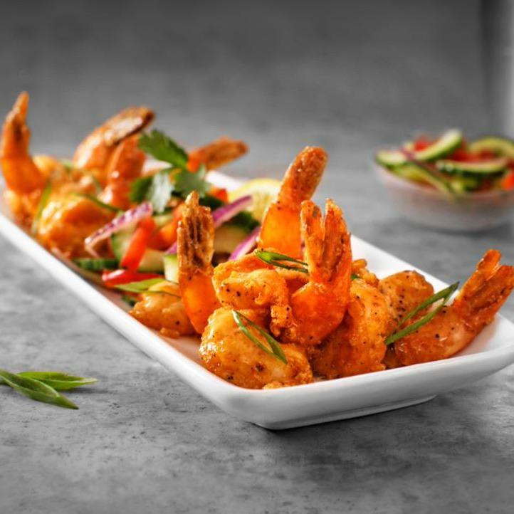 SPICY SHRIMP - succulent large shrimp, lightly fried and tossed in spicy cream sauce