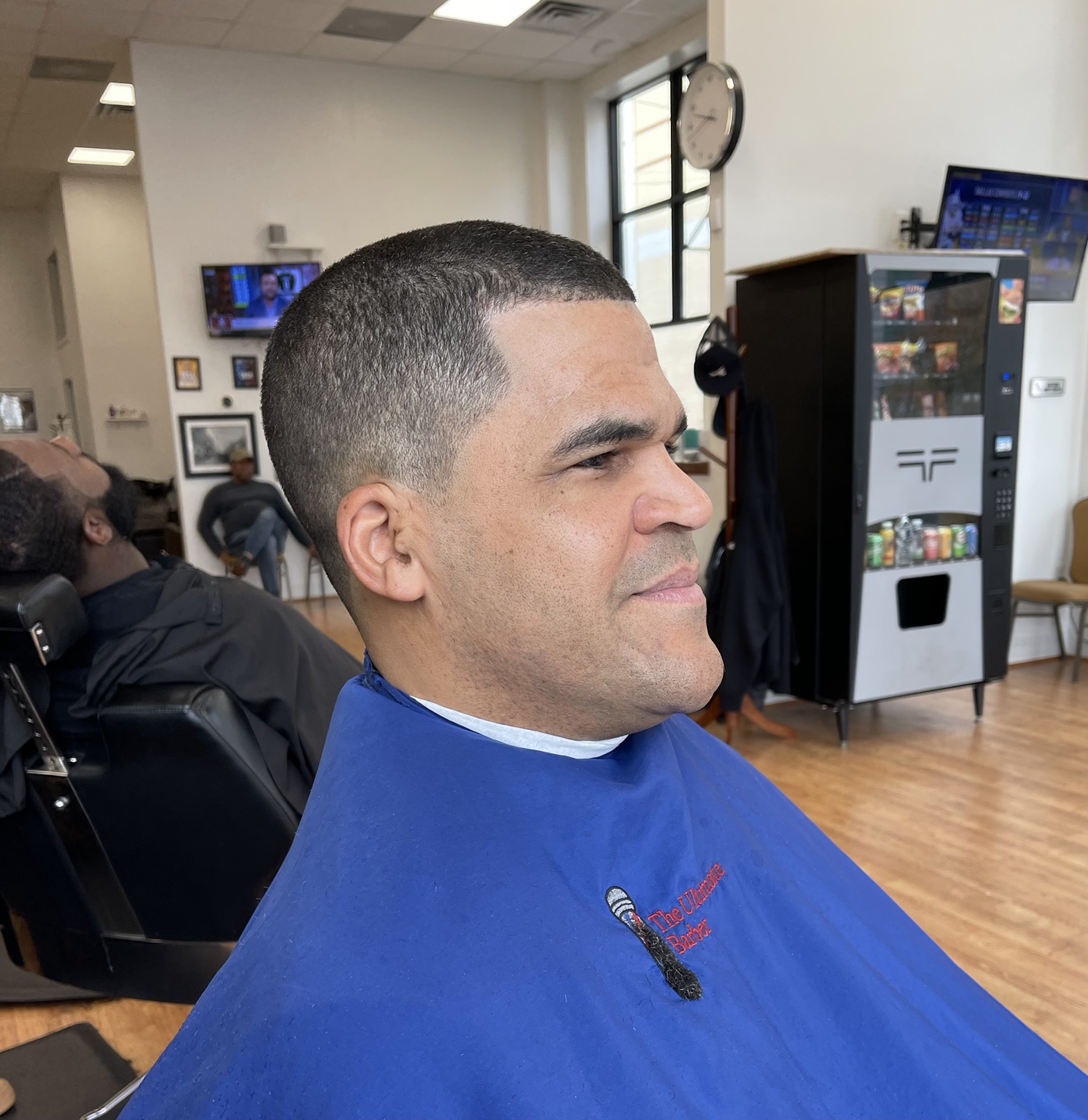 Short fade haircut at The Ultimate Barber.