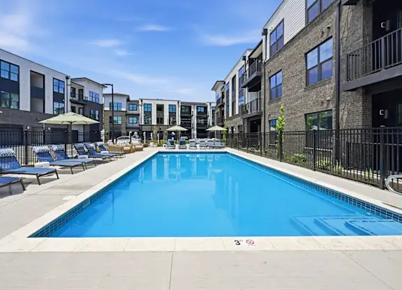Spacious Pool Deck with Comfort Loungers 