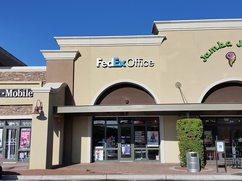 Exterior photo of FedEx Office location at 3765 S Gilbert Rd\t Print quickly and easily in the self-service area at the FedEx Office location 3765 S Gilbert Rd from email, USB, or the cloud\t FedEx Office Print & Go near 3765 S Gilbert Rd\t Shipping boxes and packing services available at FedEx Office 3765 S Gilbert Rd\t Get banners, signs, posters and prints at FedEx Office 3765 S Gilbert Rd\t Full service printing and packing at FedEx Office 3765 S Gilbert Rd\t Drop off FedEx packages near 3765 S Gilbert Rd\t FedEx shipping near 3765 S Gilbert Rd