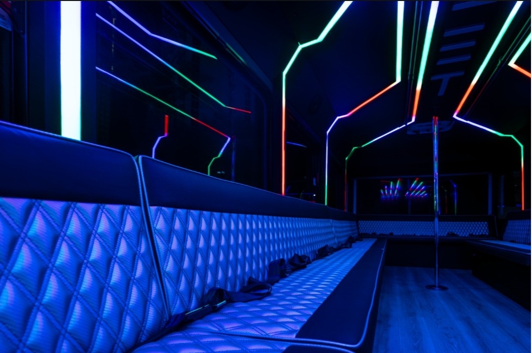 Las Vegas Party Bus 38 Passenger Let It Ride Interior with bar, dance pole and state of the art sound and lighting.