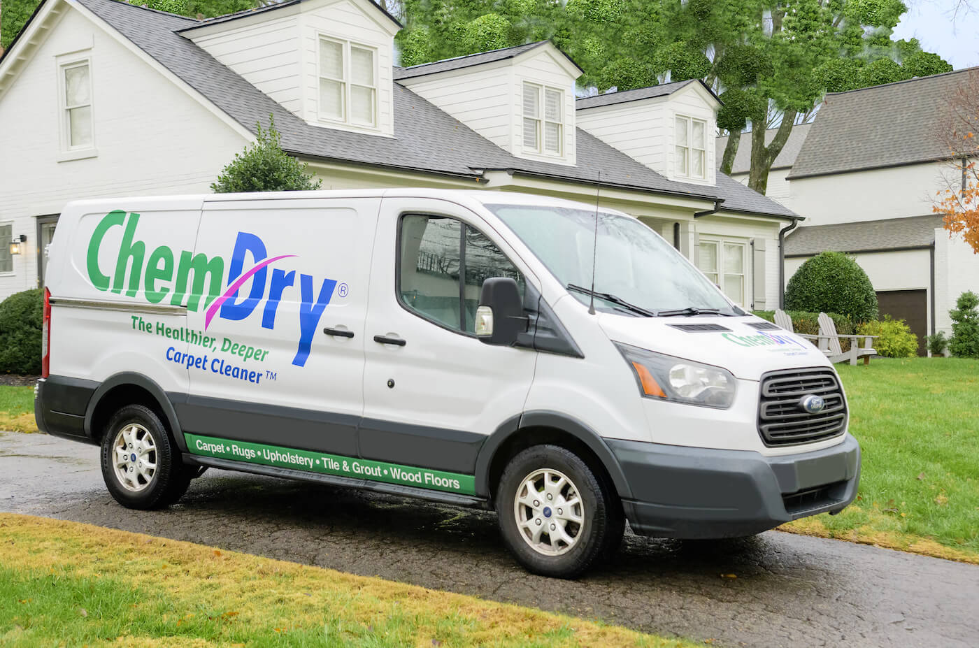 Chem-Dry van in a driveway the healthier, deeper carpet cleaner