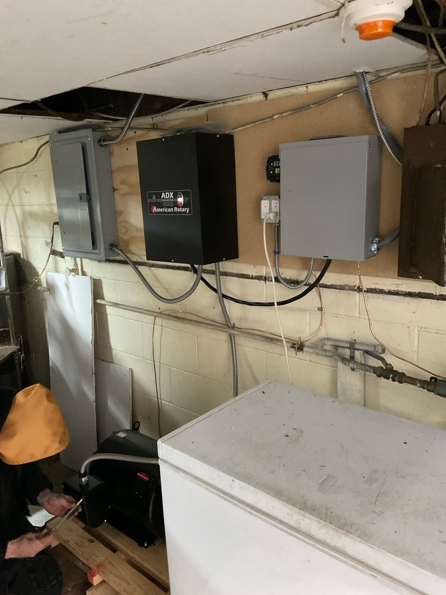 Thomas Edison Electric installed an American Rotary ADX phase converter alongside a subpanel and disconnect in a Philadelphia, PA basement. The phase converter provides three-phase power from a single-phase supply, supporting commercial or heavy-duty equipment on site.