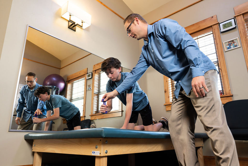 physical therapist in logan with a patient