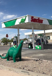 Sinclair gas station fueling island and DINO statue