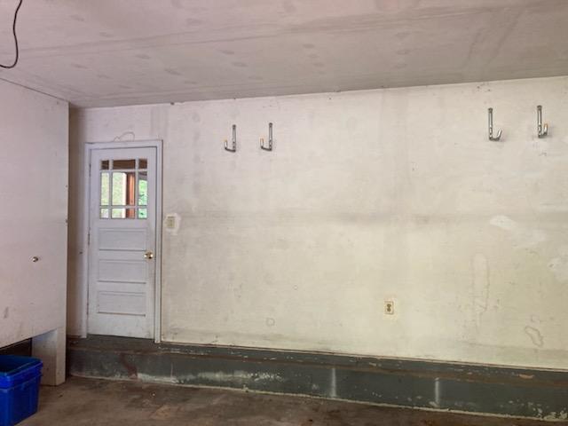 Today our handyman primed and painted the interior of this garage, door, and window in Andover, MA.
