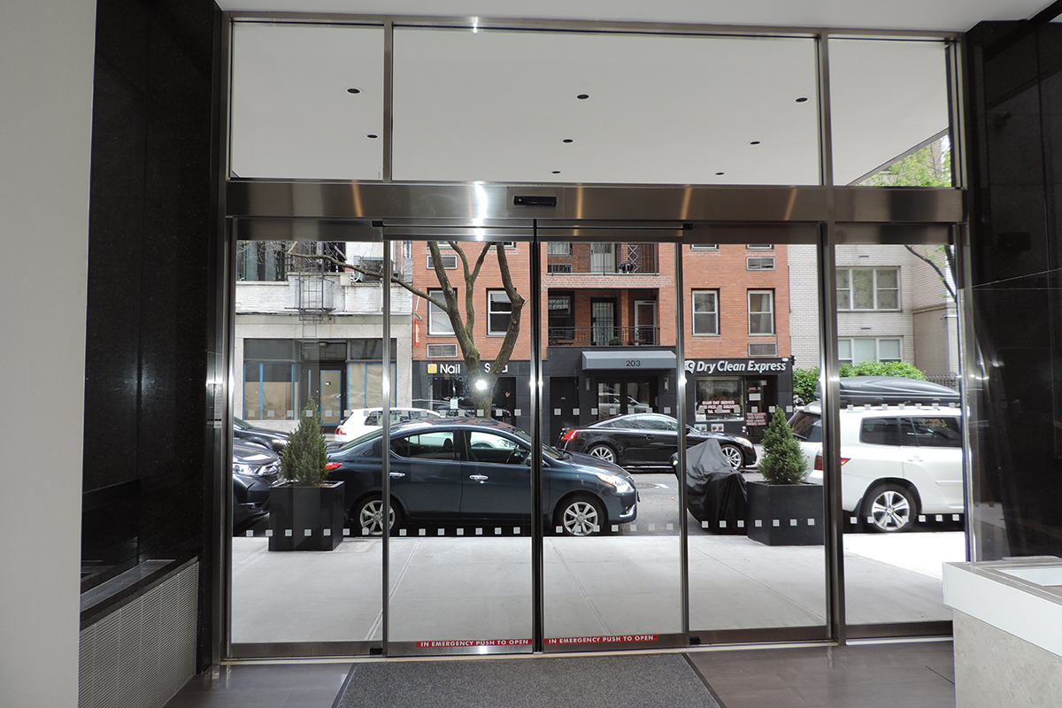 Call to treat your building to new sliding doors!