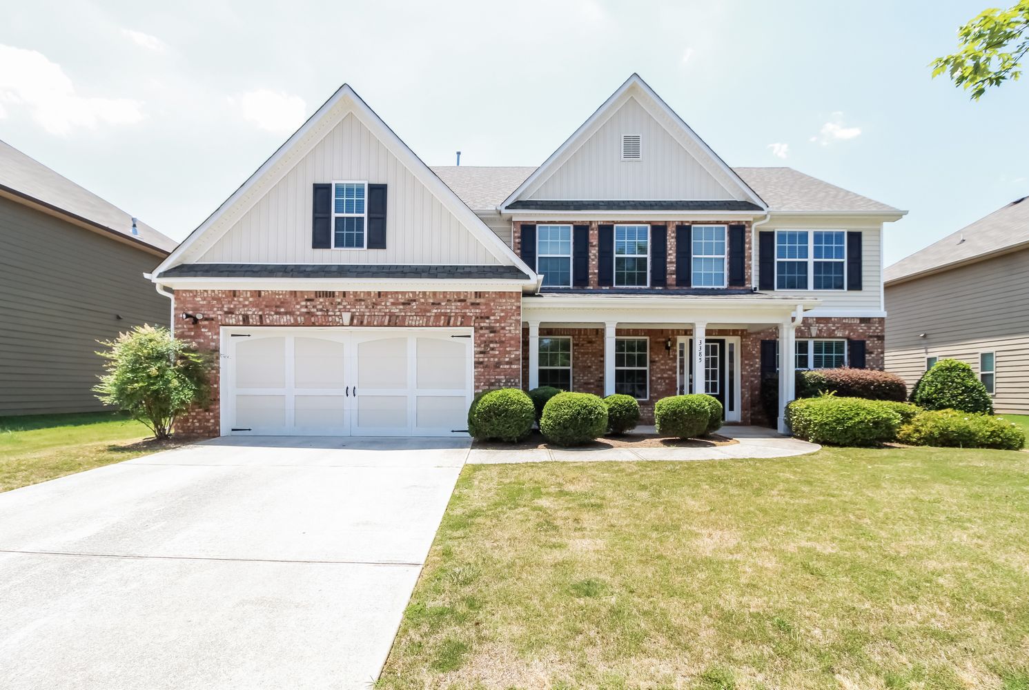 Beautiful home with covered porch at Invitation Homes Atlanta.