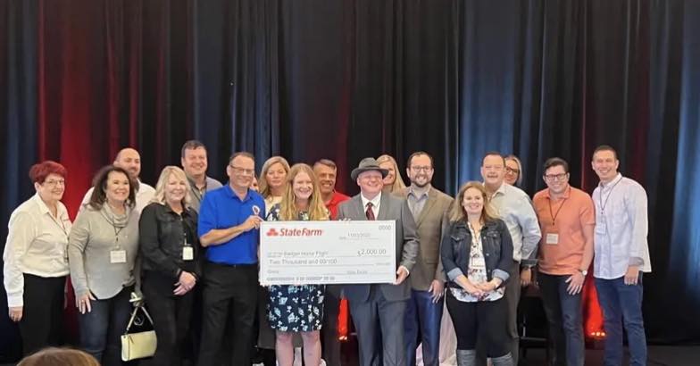 Proud to have been part of presenting a $2,000 donation to the Badger Honor Flight along with these other amazing State Farm Agents.