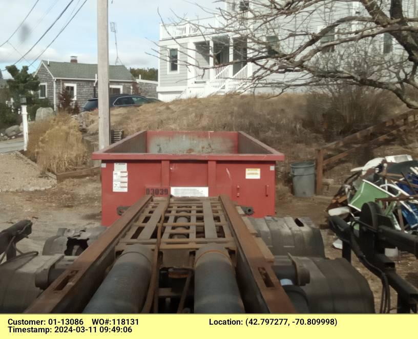 Title: 30 yard dumpster with a 4 ton weight limit delivered in Newbury, MA for a construction project.