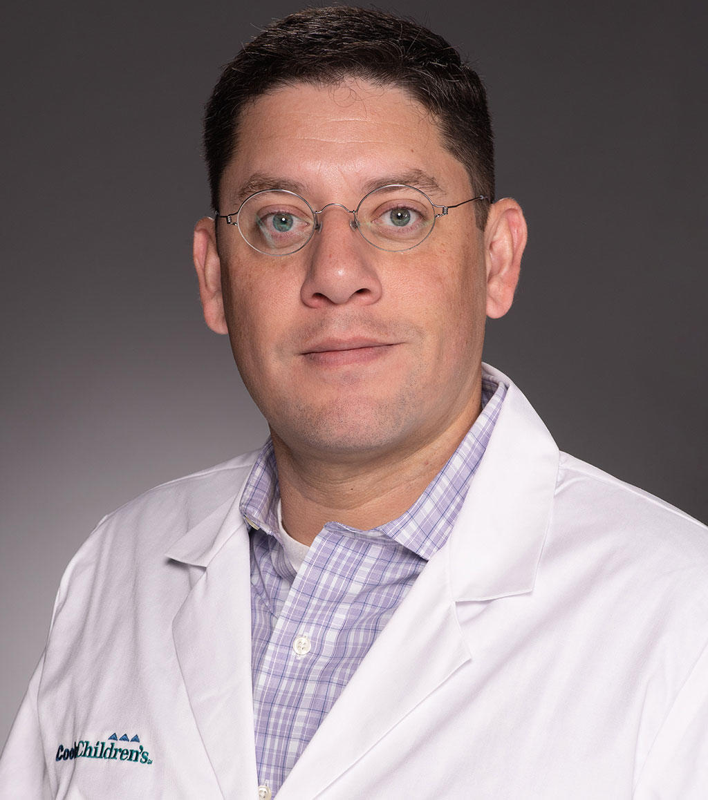 Headshot of Dr. Christopher R. Estrada