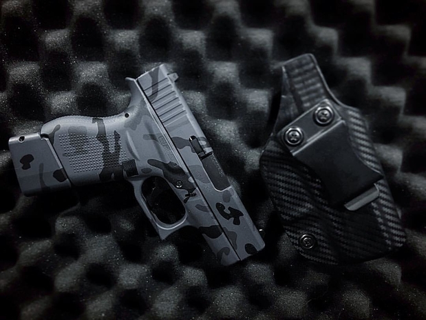 Images Armory Valentine, LLC Cerakote Coating, Laser Engraving & Custom Holsters