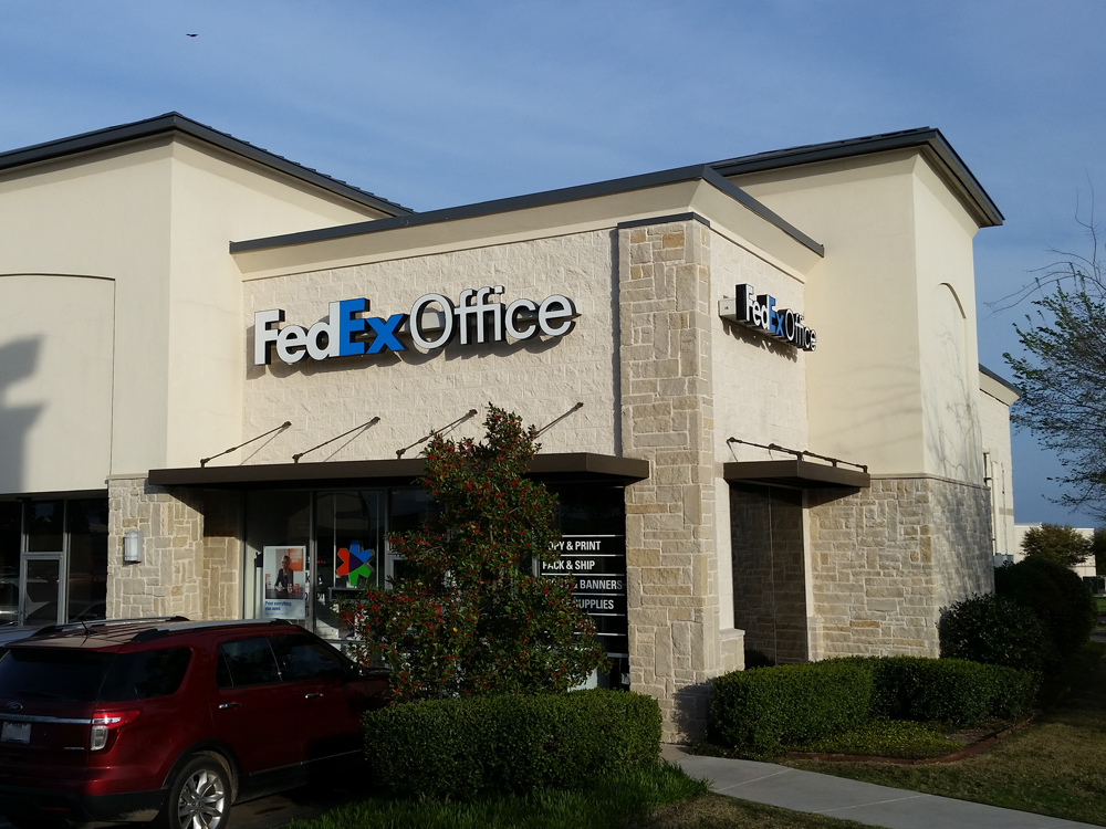 Exterior photo of FedEx Office location at 909 E Ih 30\t Print quickly and easily in the self-service area at the FedEx Office location 909 E Ih 30 from email, USB, or the cloud\t FedEx Office Print & Go near 909 E Ih 30\t Shipping boxes and packing services available at FedEx Office 909 E Ih 30\t Get banners, signs, posters and prints at FedEx Office 909 E Ih 30\t Full service printing and packing at FedEx Office 909 E Ih 30\t Drop off FedEx packages near 909 E Ih 30\t FedEx shipping near 909 E Ih 30