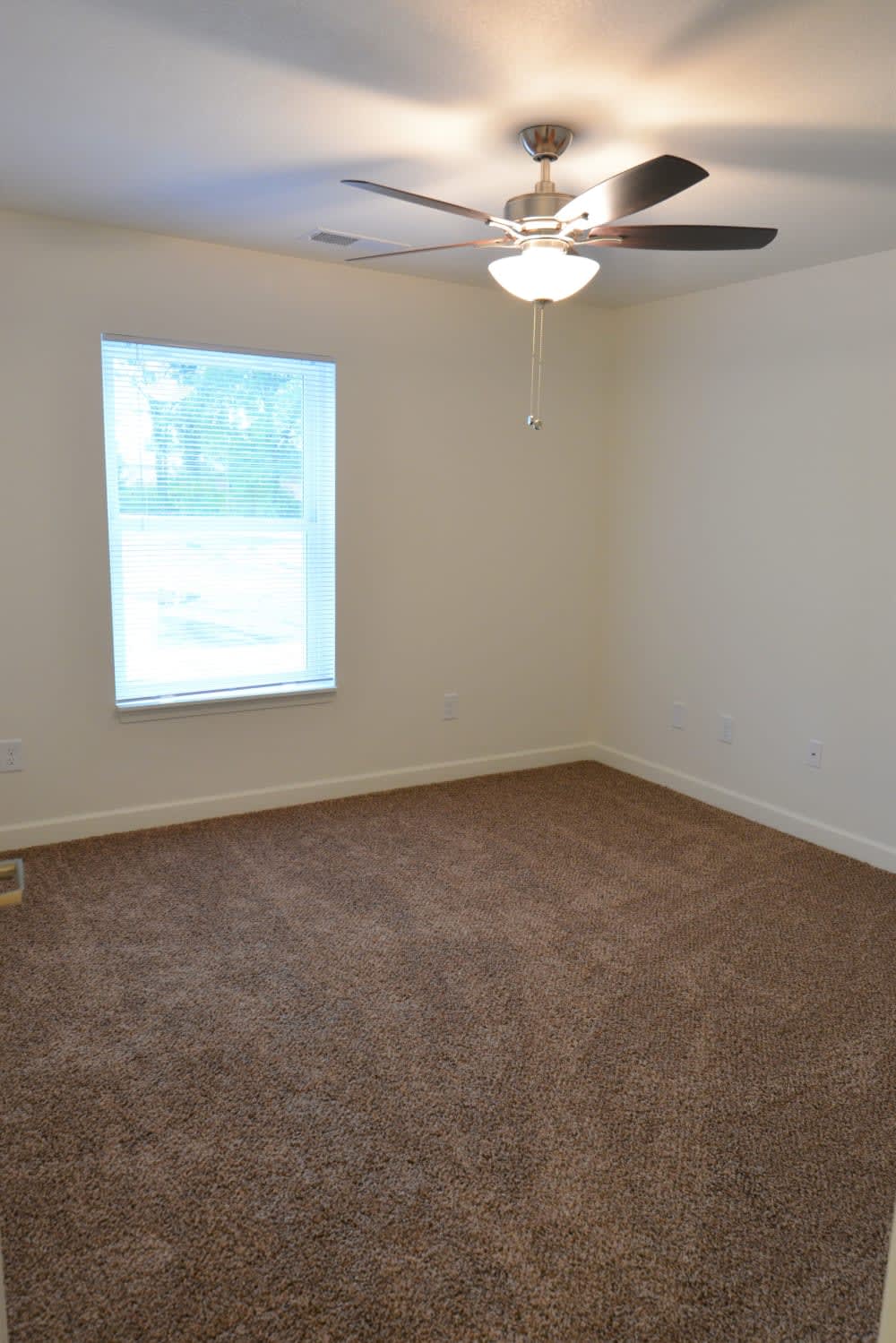 Spacious Carpeted Bedroom