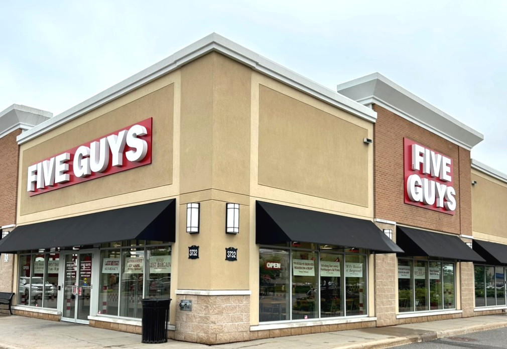 An exterior photograph of the Five Guys restaurant at 3732 Innes Road in Orleans, Ontario, Canada. Five Guys Orleans (613)824-6270