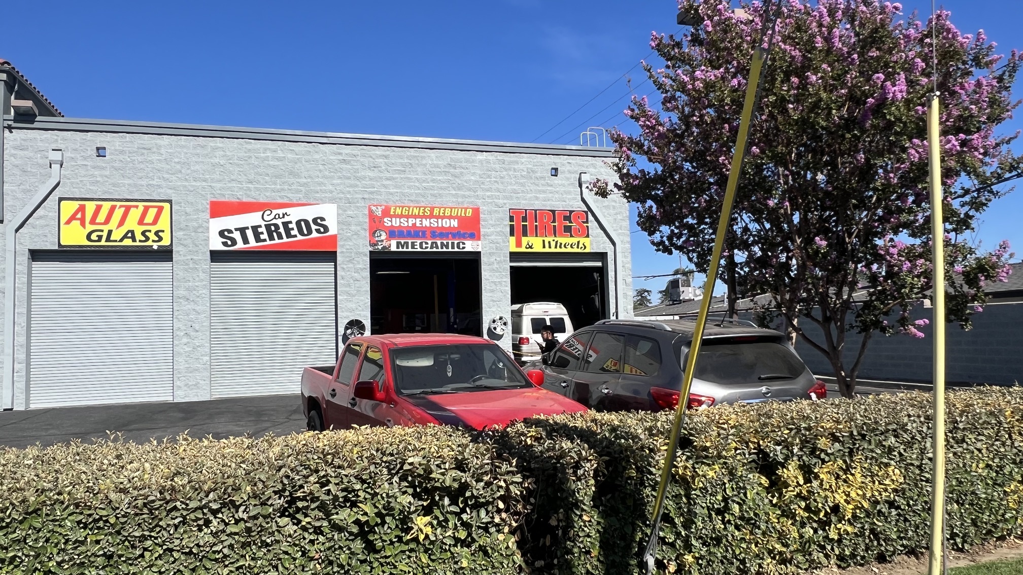 2BleAAuto Mechanic - outside of autoshop 