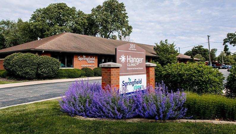 Exterior of medical office building with blooming landscaping in Springfield, Illinois Springfield Clinic Chiropractic Springfield (217)546-5971