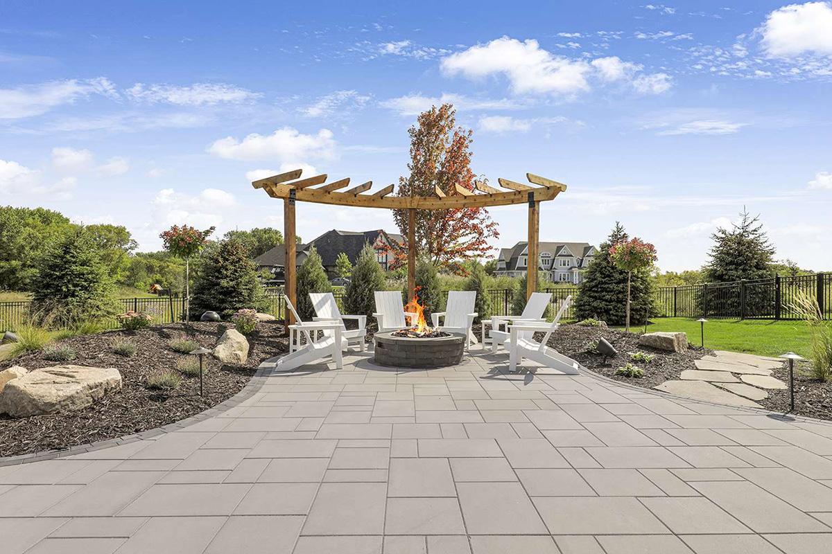 Outdoor Patio Hardscaping with Portico and Fire Pit