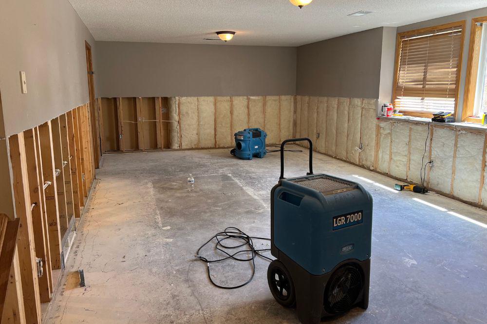 Pictured here is Minneapolis water damage in a basement living room.