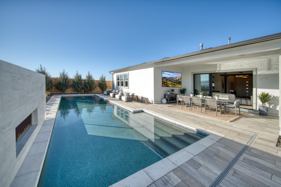 Covered rear patio is perfect for entertaining or dining al fresco