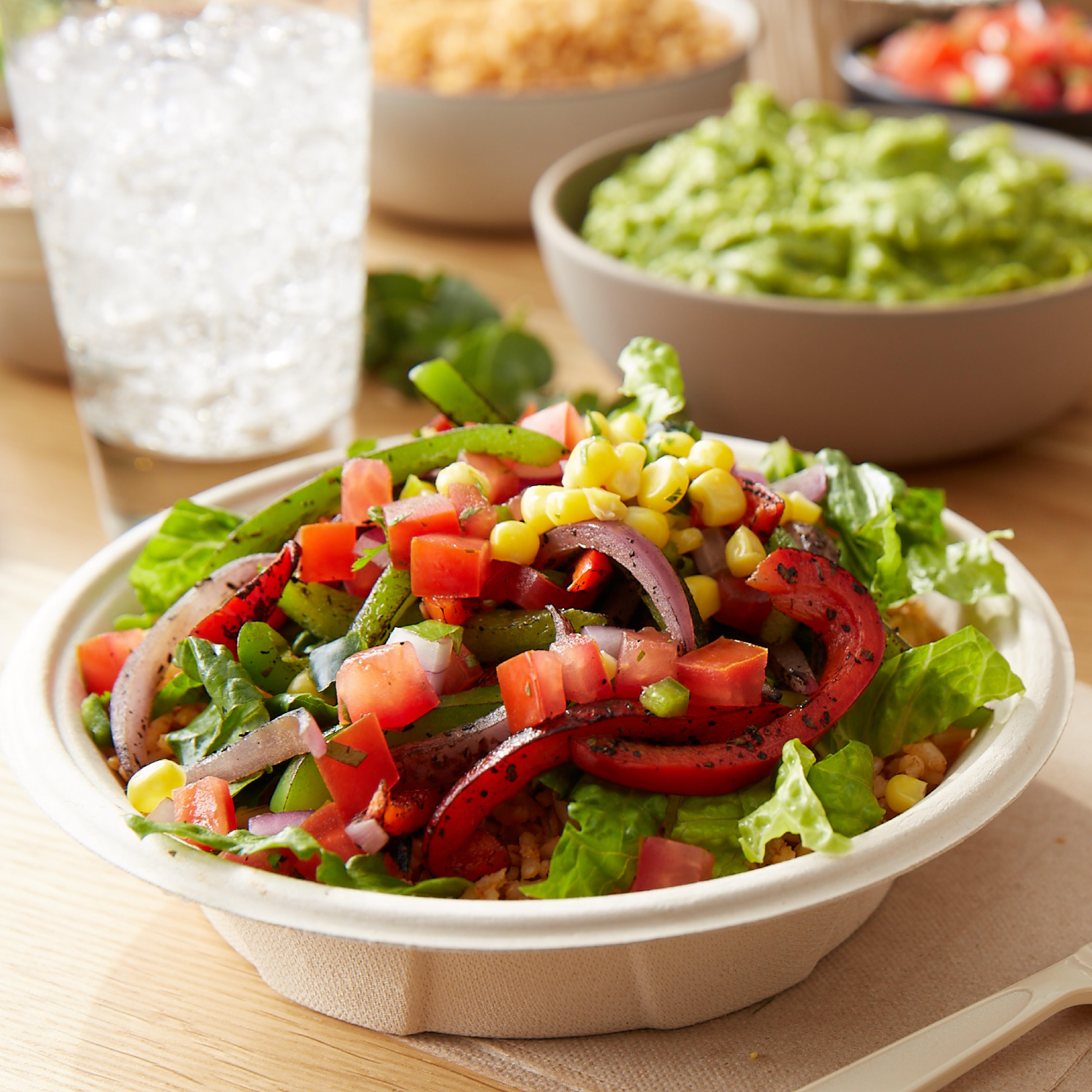 Salads are made with crisp romaine and can be topped with fresh ingredients like flame-grilled fajita vegetables, freshly-made pico de gallo and chile corn salsa and a protein of your choice.