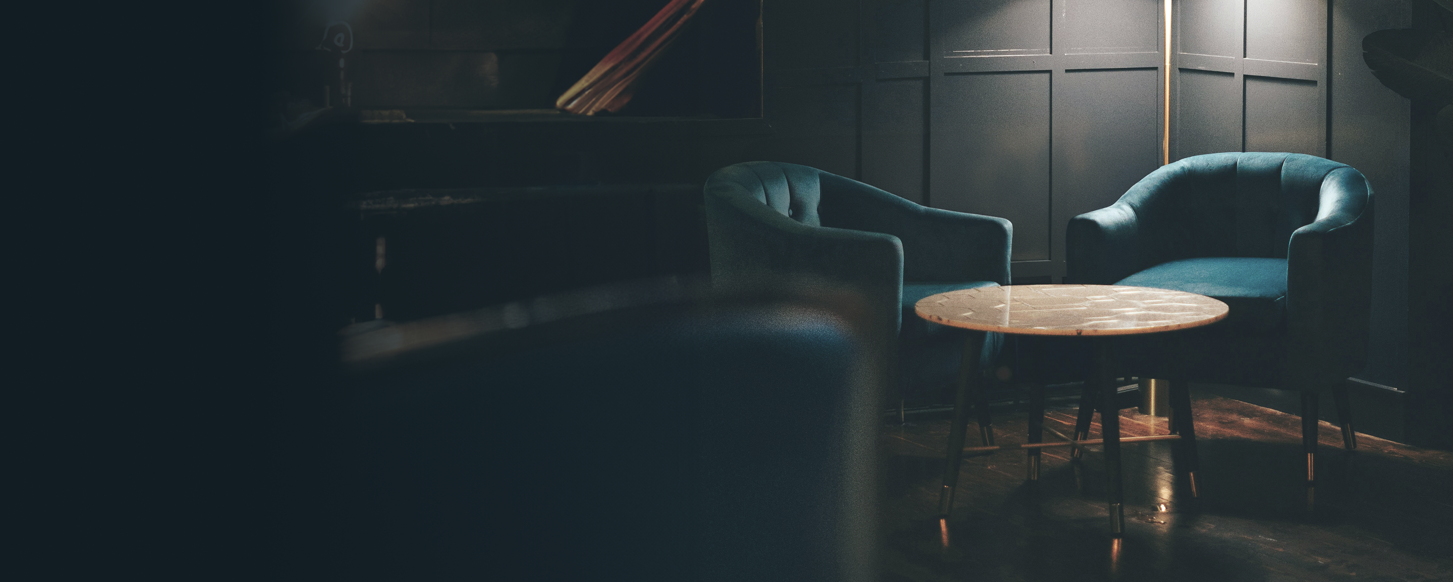 Room corner with chairs and a table.