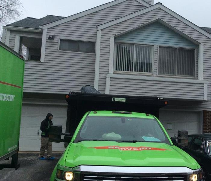 Here at SERVPRO of Hockessin we are always on the go.  This picture shows two trucks at a job site. The second truck, a dump truck, only came to help with removing some additional debris.