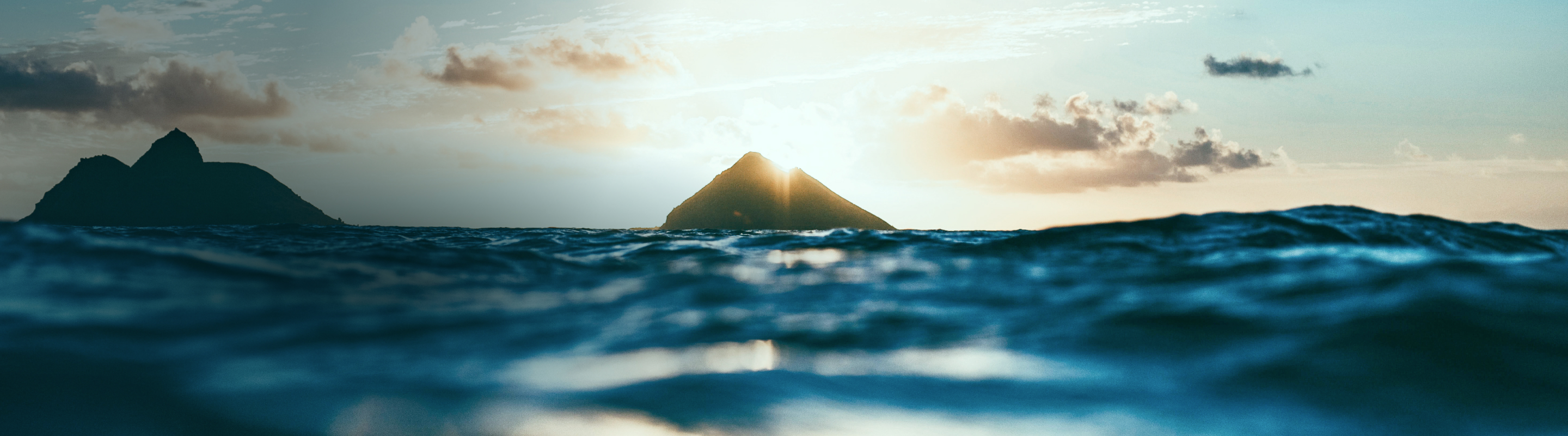 Close-up of waves at sunset.